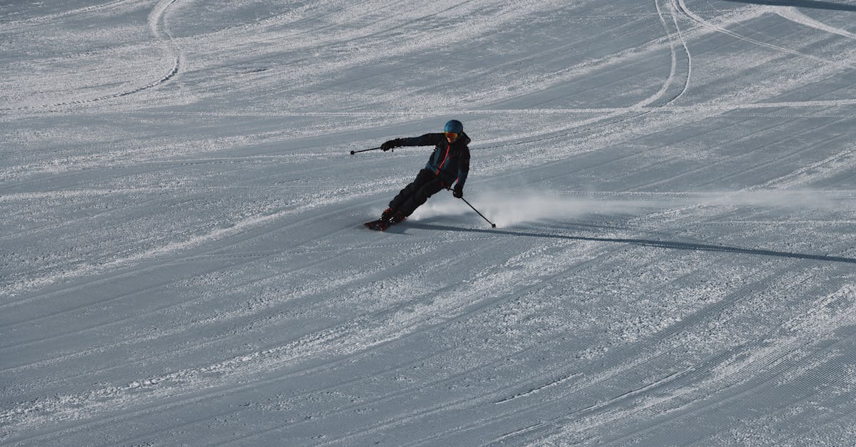 A skier gracefully navigates a snowy slope in Soelden, Austria during winter.
