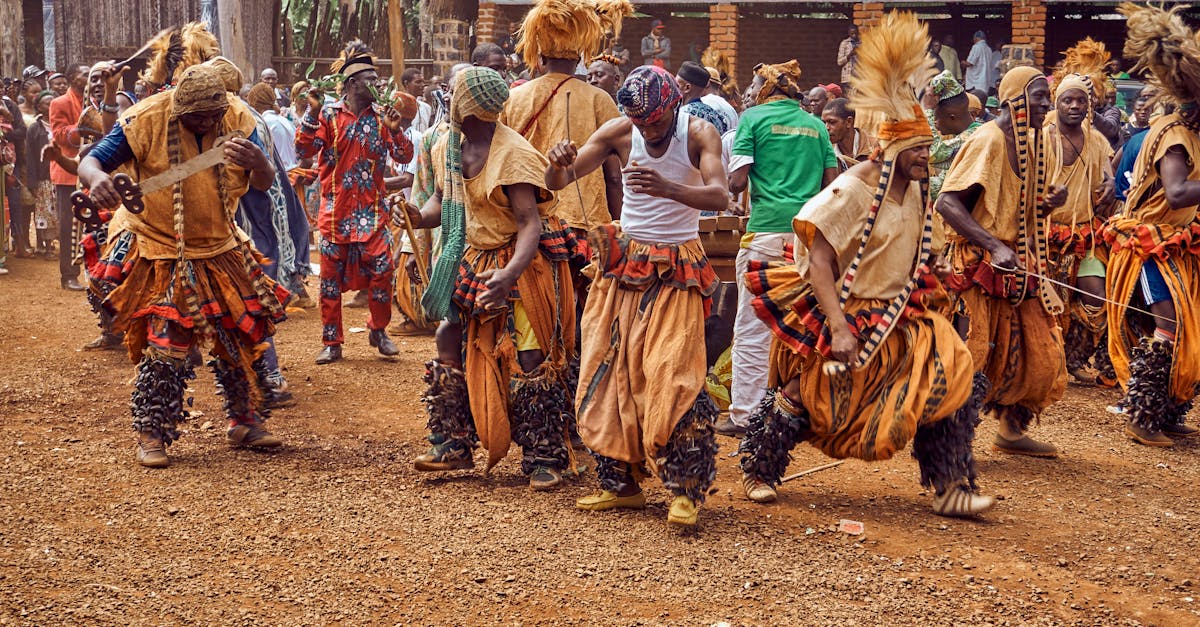 African dancers showcasing traditional costumes and dance during a cultural festival.