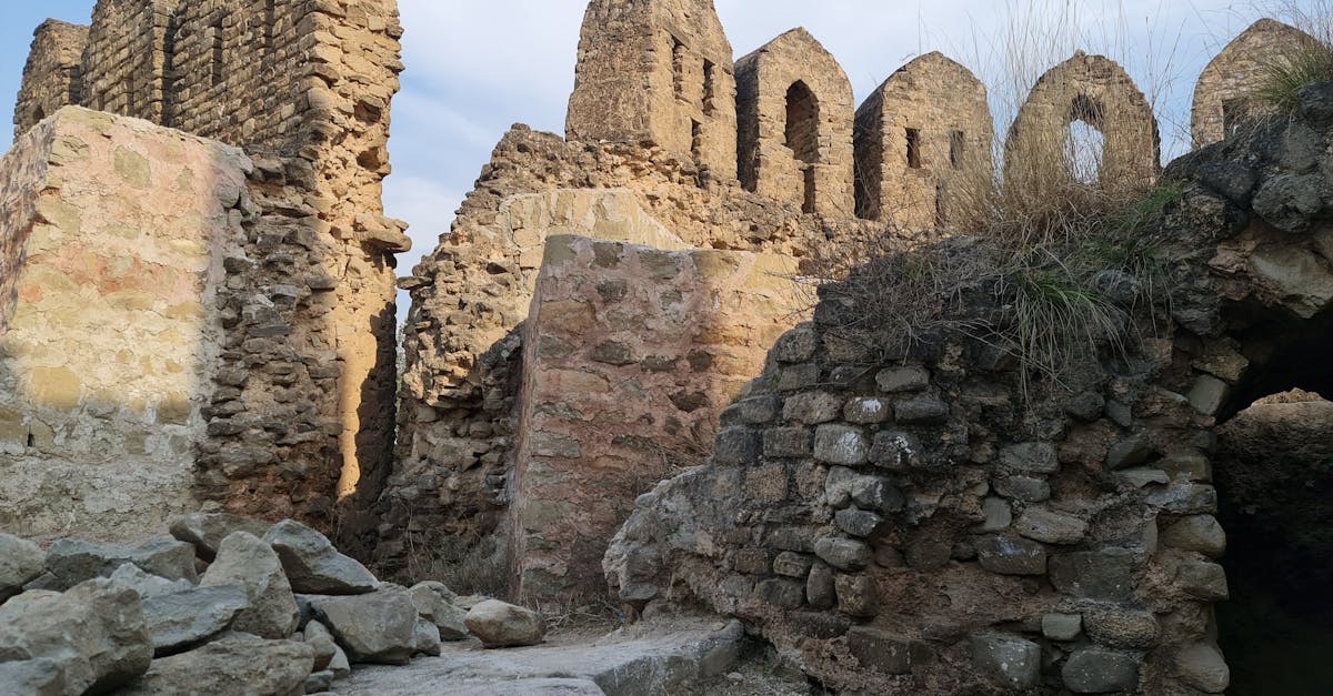 Explore the mysterious medieval ruins with old stone walls and arches.