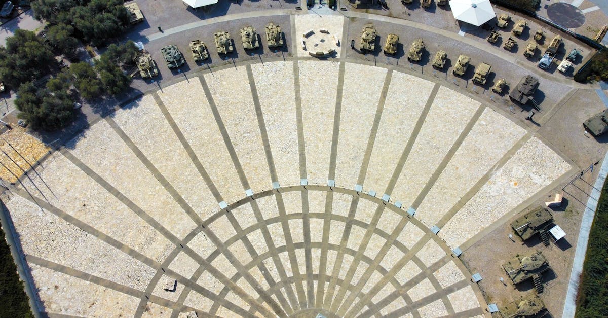 Drone shot of military vehicles displayed outdoors in a museum, Jerusalem, Israel.