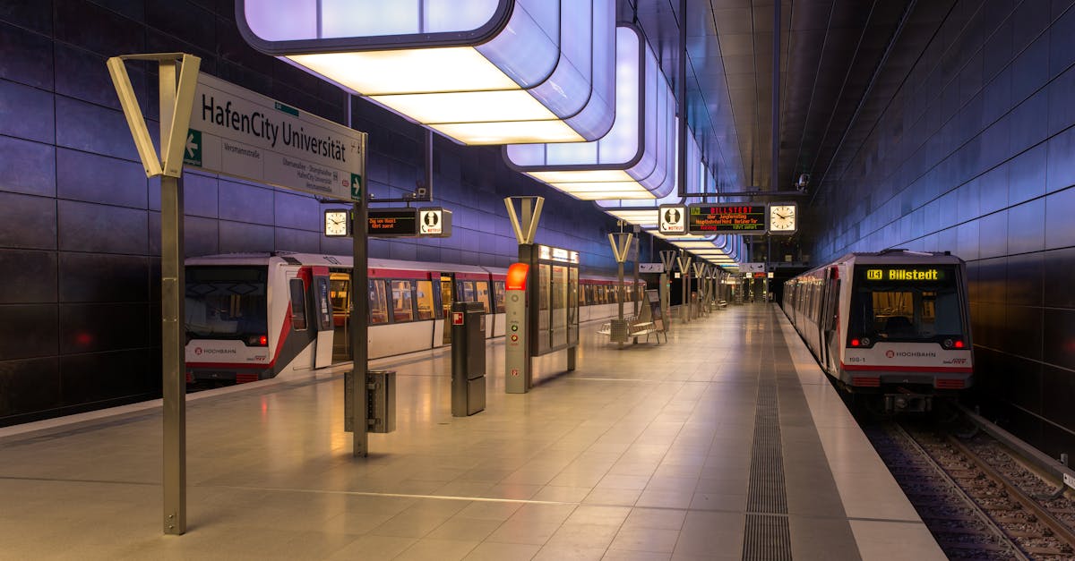 Explore the sleek design of HafenCity Universität subway station in Hamburg with vibrant lighting and modern architecture.