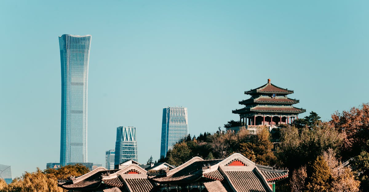 Captivating view of Beijing's skyline featuring traditional architecture and the modern China Zun skyscraper.