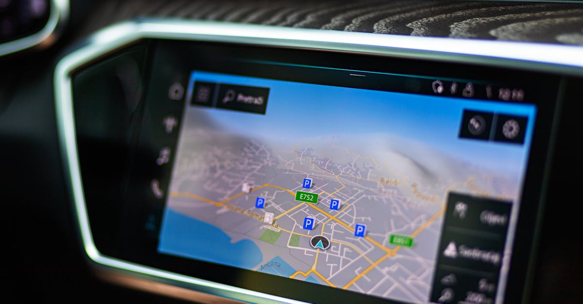 Close-up of a car's touchscreen displaying GPS navigation in a modern vehicle interior.