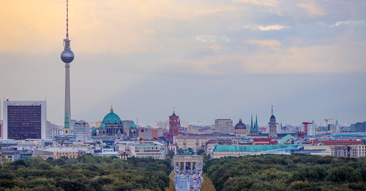 A breathtaking view of Berlin's skyline with the Fernsehturm and Brandenburg Gate.