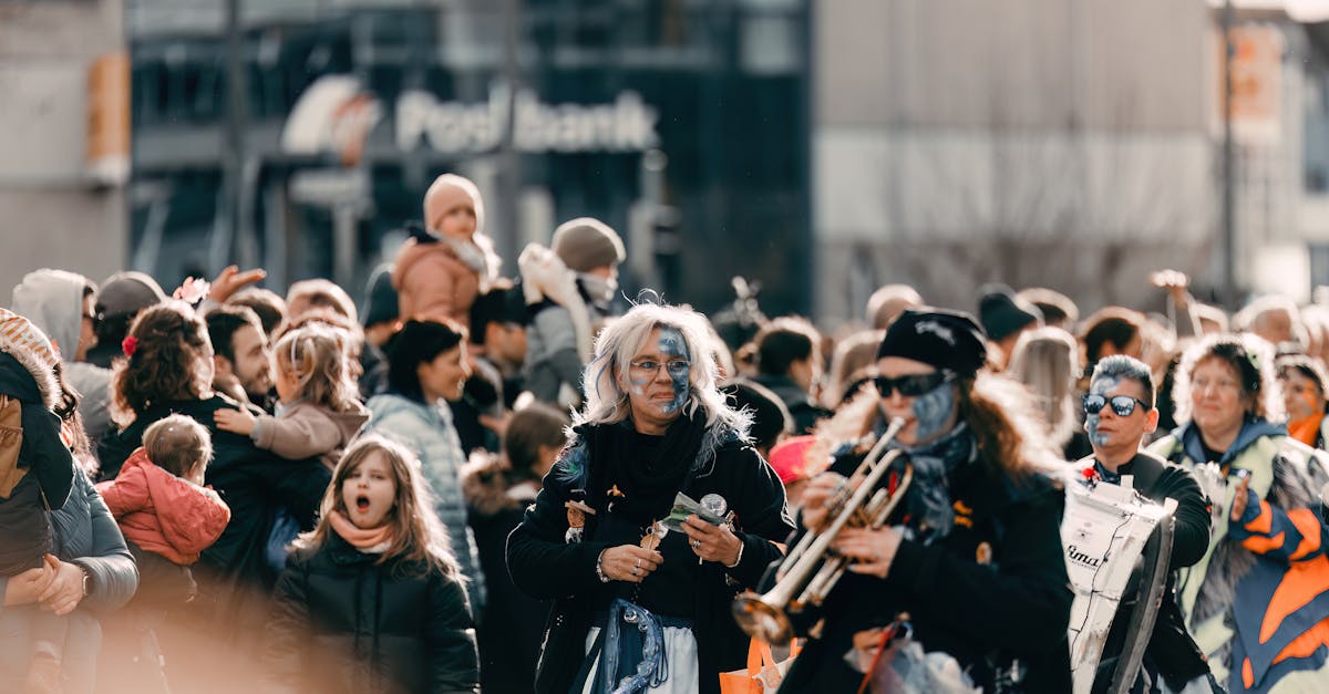 A lively street parade in Leonberg, Germany with crowds and painted faces.