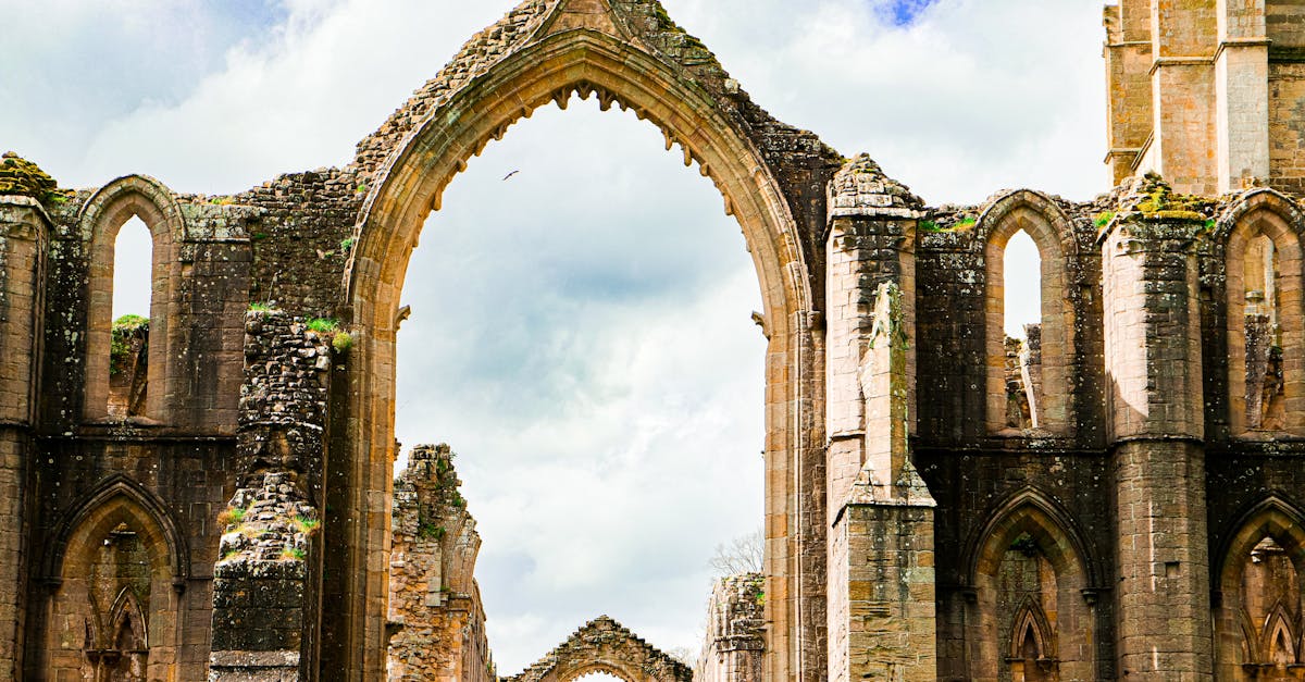 Explore the majestic ruins of an ancient Gothic church, showcasing architectural beauty.