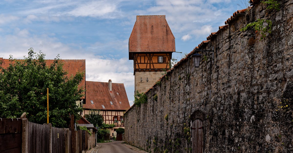 Scenic view of Bauerlin Tower and medieval alley in Dinkelsbühl's old town.