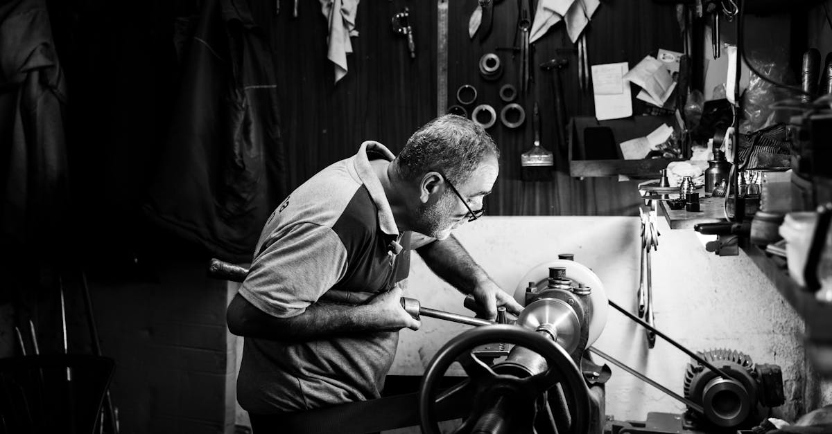 Skilled artisan at work in an Istanbul workshop, focused on crafting using traditional tools.