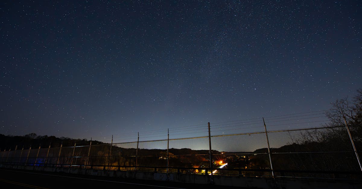 A serene night sky with stars over a bridge in Nashville, Tennessee.