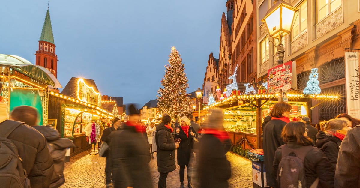 A bustling Christmas market scene with festive lights and decorations in Frankfurt.