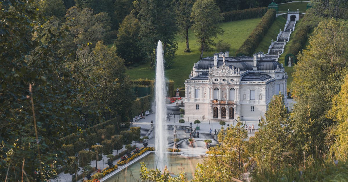 A stunning view of Ettal Palace's architecture and beautiful gardens in Bavaria, Germany.