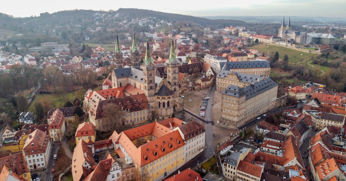 Aerial shot of Bamberg, Germany featuring the historic cathedral and old town buildings.