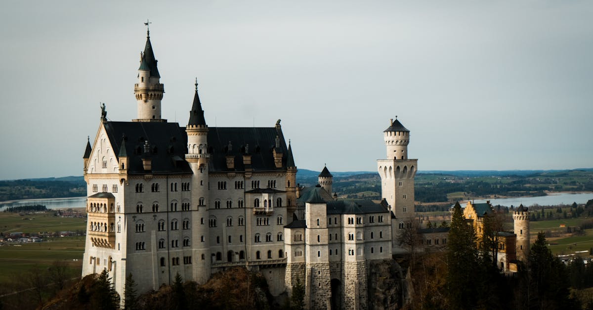 Breathtaking view of Neuschwanstein Castle amidst the picturesque Bavarian landscape.