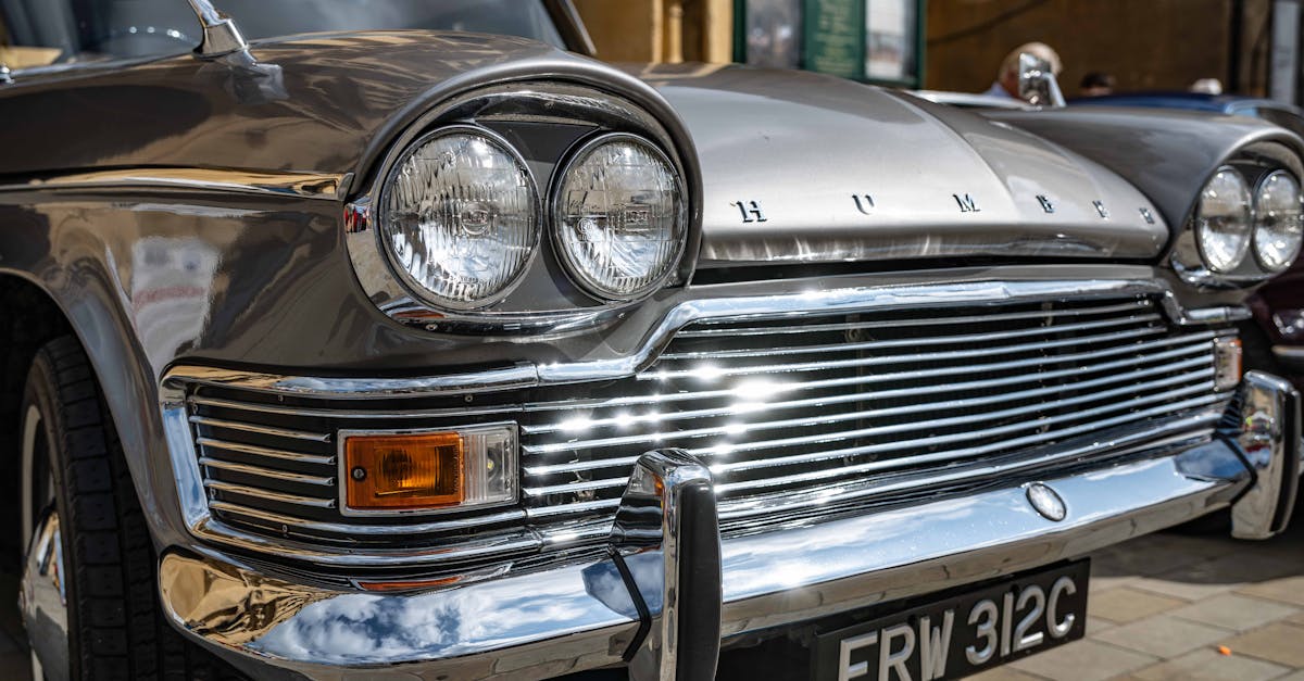 Detailed view of a vintage Humber car showcasing its iconic front grille and headlights.