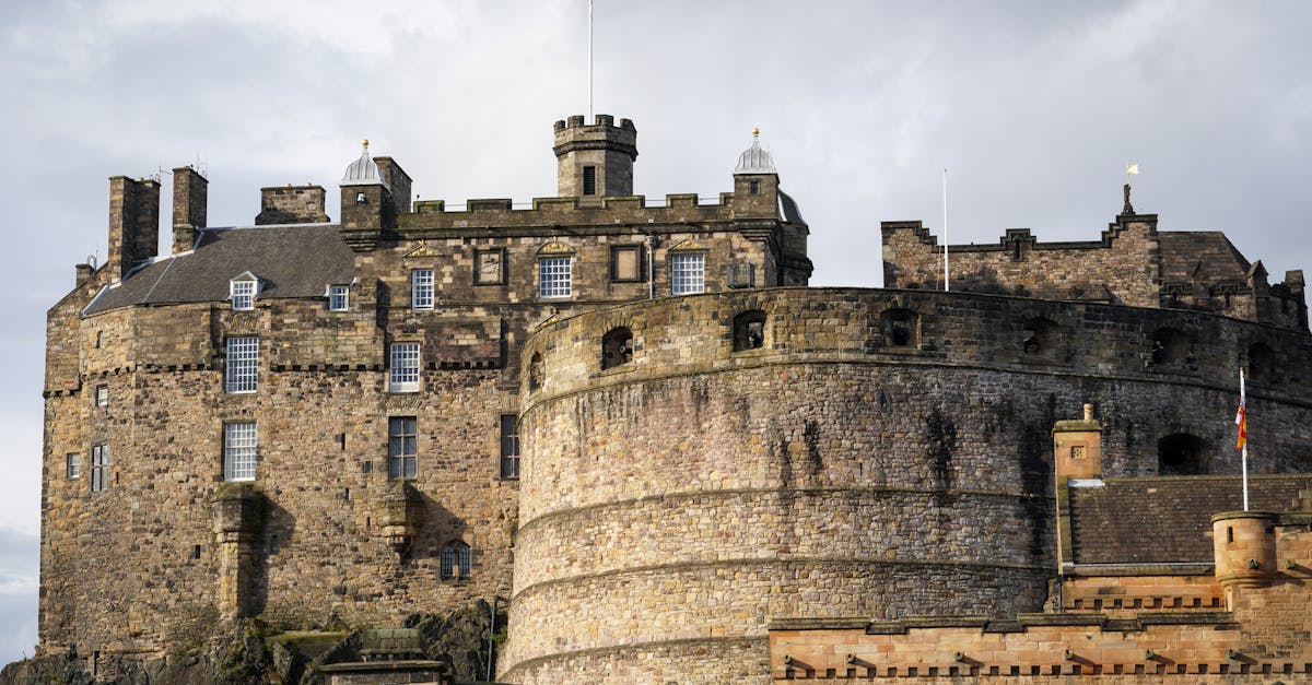 A stunning view of the historic Edinburgh Castle, a prominent landmark in Scotland, captured in daylight.