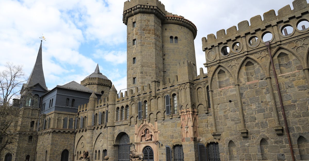 Majestic historical castle facade in Kassel, Germany, showcasing Gothic architecture.