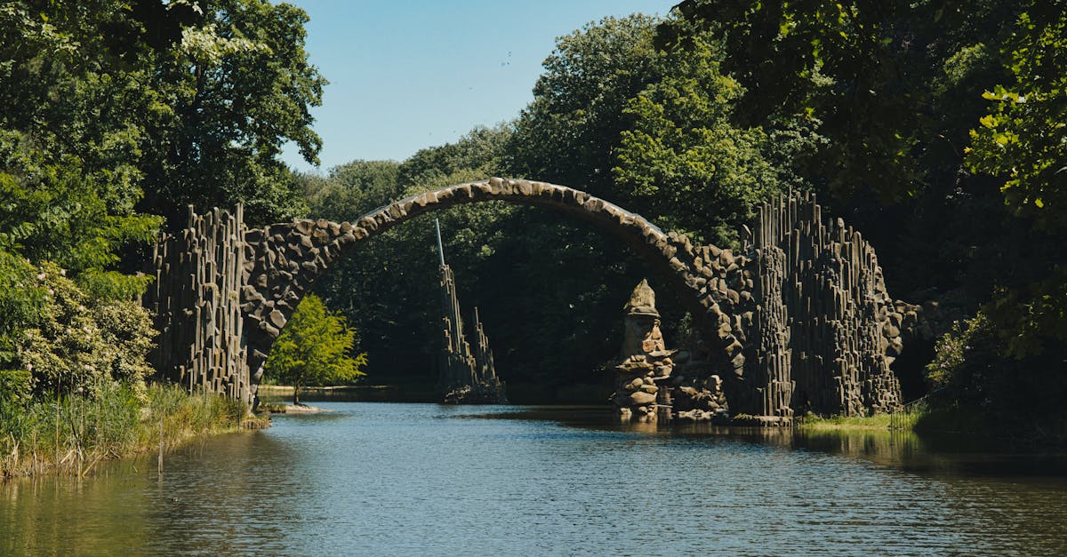 Explore the stunning Rakotzbrücke, known as Devil's Bridge, in Kromlau Park, Germany.