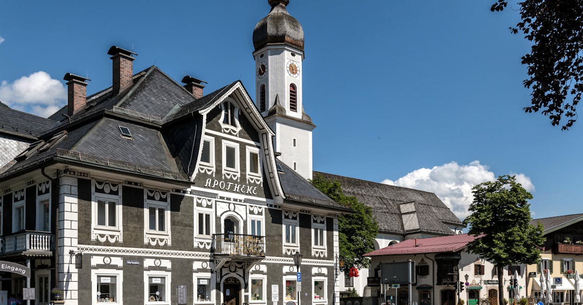 Explore the charming painted architecture of Garmisch-Partenkirchen, a picturesque Bavarian town.