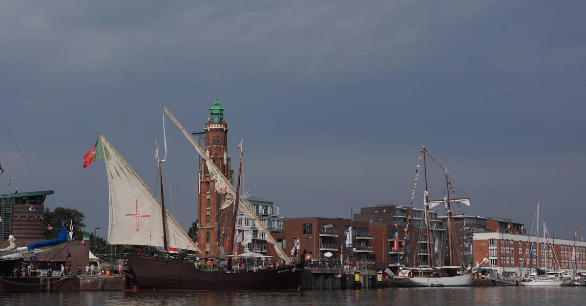 Classic ships anchored at Bremerhaven harbor, showcasing maritime history.