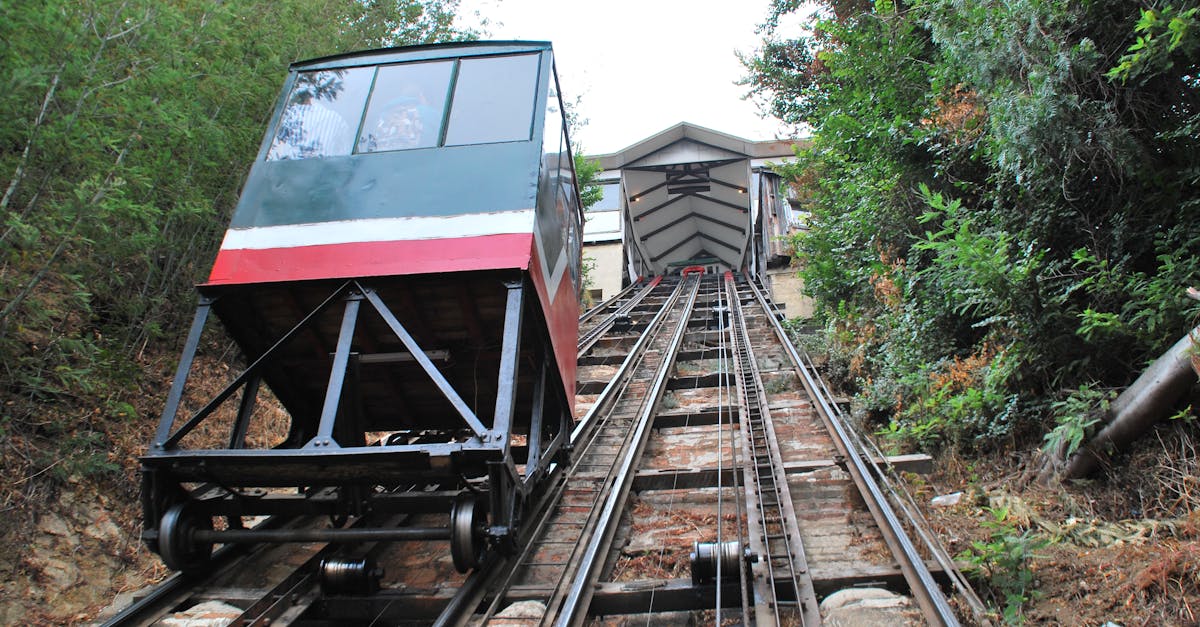 Scenic view of funicular railway in Valparaíso, Chile, surrounded by lush greenery.