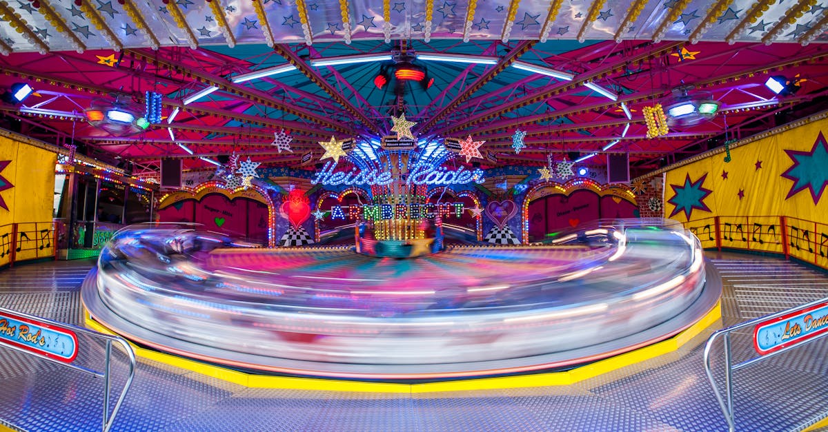 Experience the exhilarating rides and neon lights at Hannover's vibrant amusement park at night.