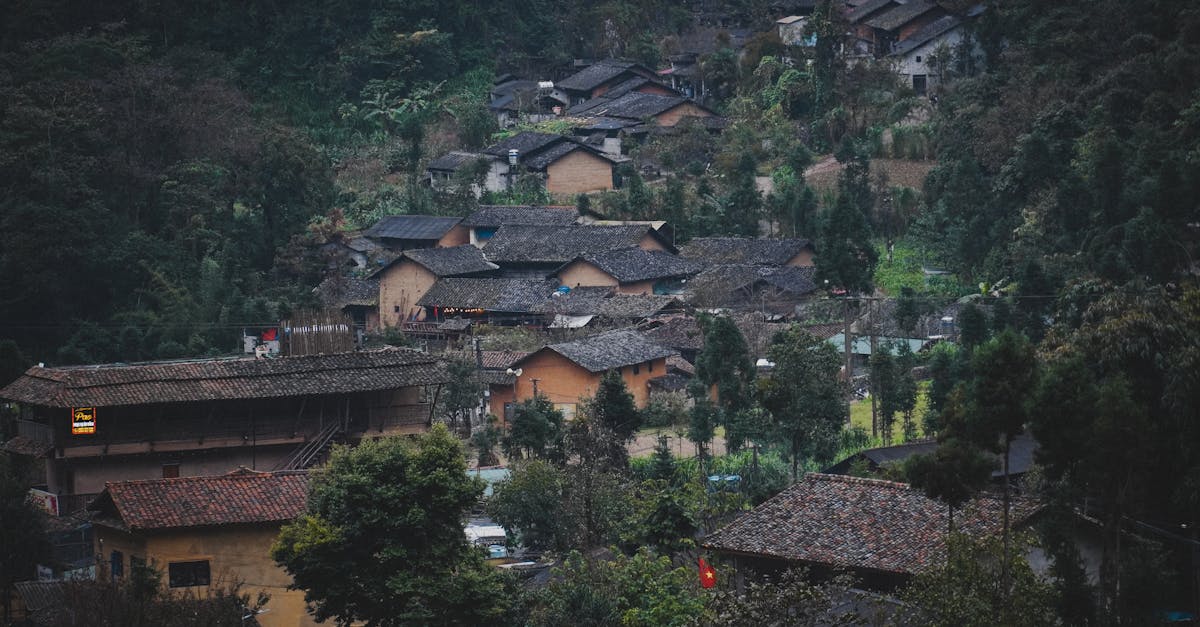 Charming rustic village surrounded by lush greenery in Ha Giang, Vietnam.