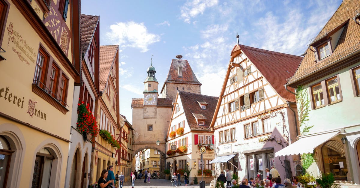 Picturesque cobblestone street in Rothenburg ob der Tauber showcasing traditional German architecture.