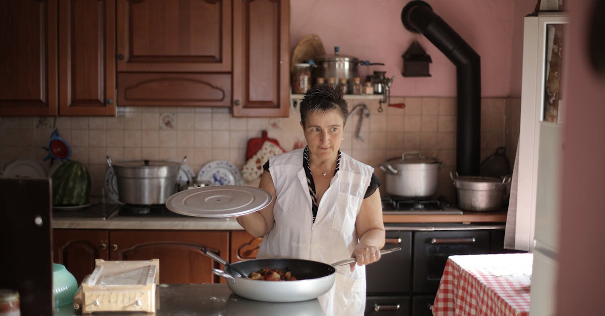 A woman cooking at home, showcasing culinary skills in a rustic kitchen setting.