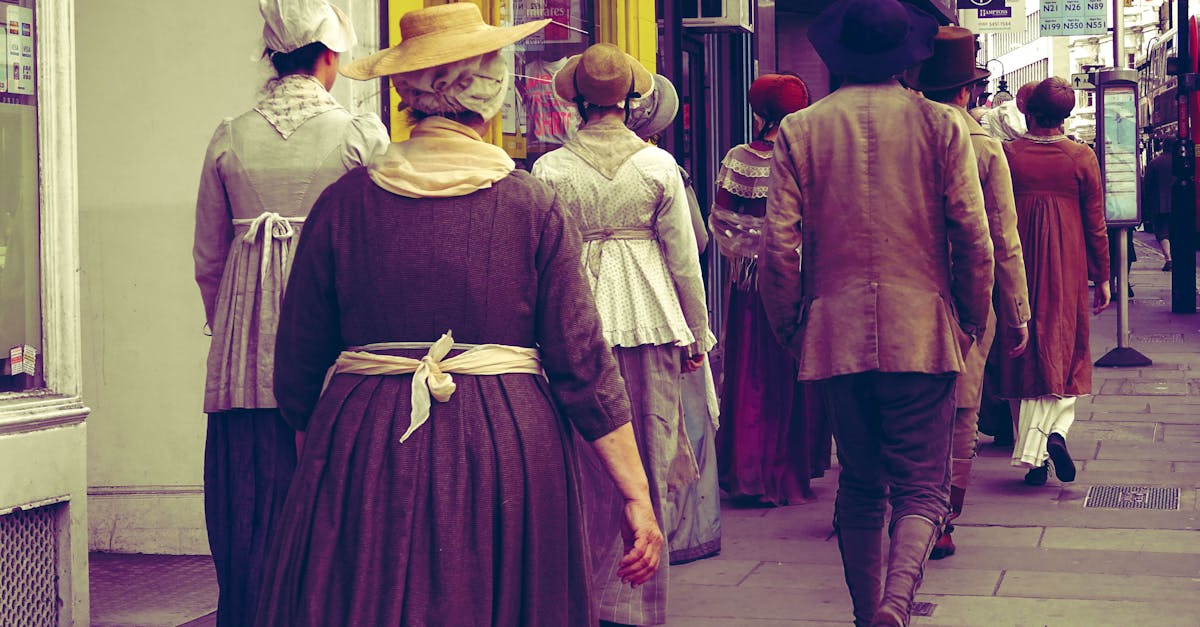 People in historical costumes walking on a city street, evoking a vintage ambiance.
