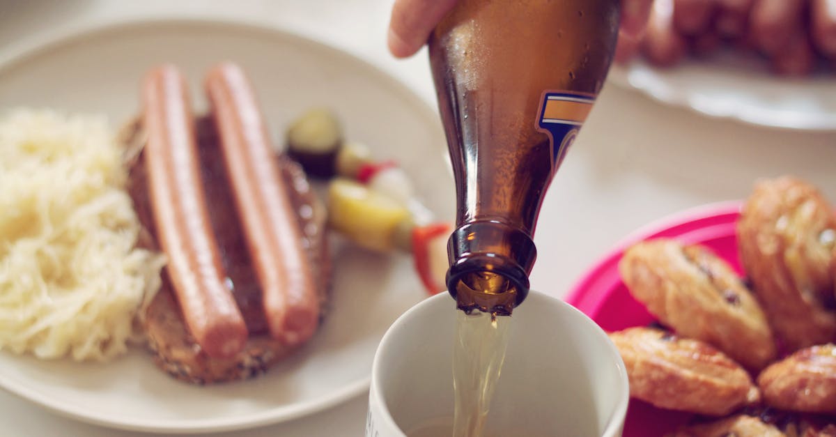Enjoy a classic German meal with sausages, beer, and pastries in a cozy setting.