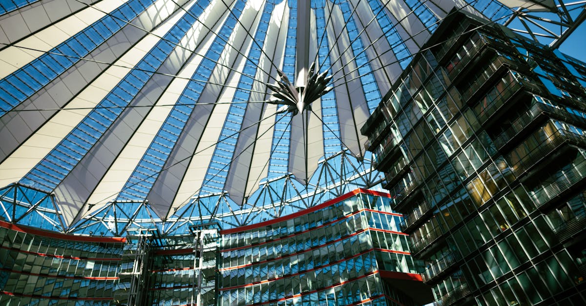 Striking view of a contemporary architectural structure featuring a futuristic dome and glass buildings.